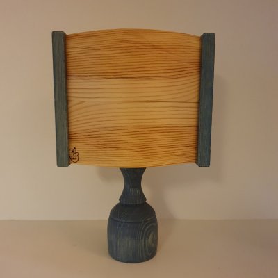 Bordlampa skeppet mellan blå släckt